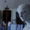 white ceramic bust on table