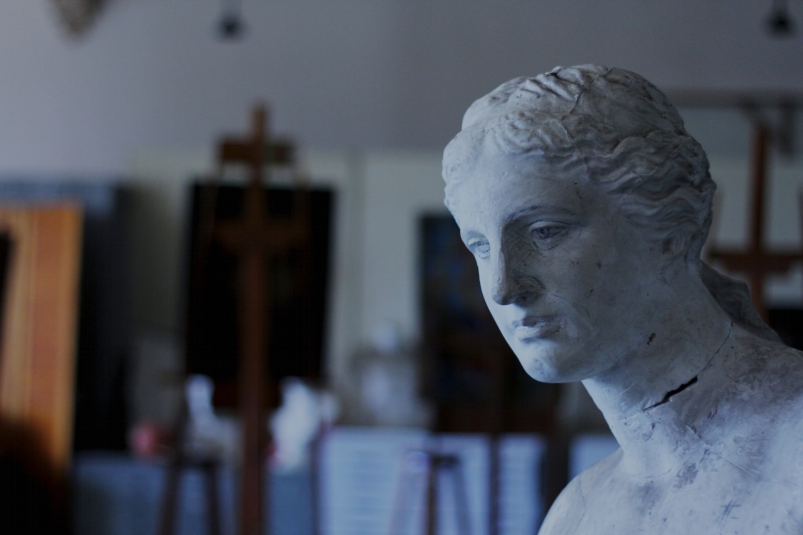 white ceramic bust on table